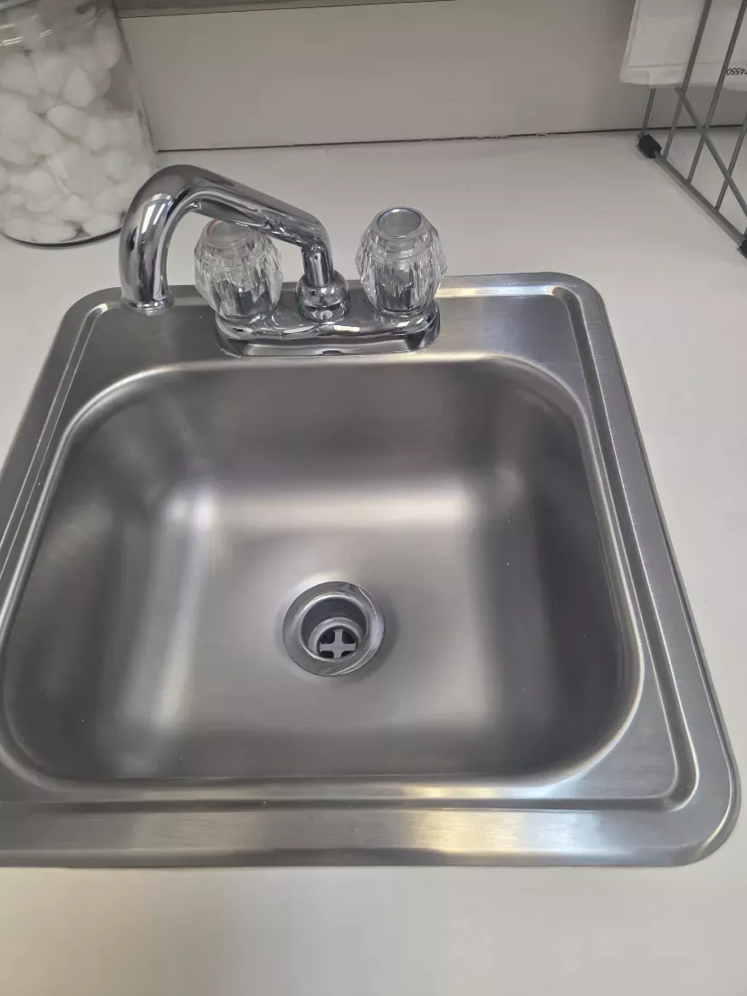 Stainless break-room sink and faucet cleaned and polished